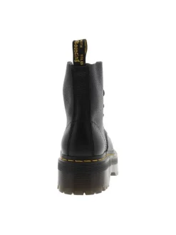 Boots en cuir noires à talon plateau avec un zip et revêtement en grains