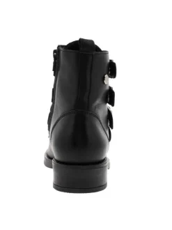 Boots en cuir noir à semelle et talon plat et à zip latérale intérieur