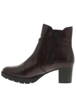 Boots noirs vernis à talon décroché moyen avec un zip et un soufflet élastiqué