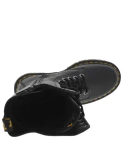 Bottes en cuir noires à talon décroché bas avec un zip et des lacets ronds