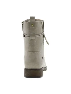 Bottines écrues à talon décroché bas avec un zip et des lacets ronds