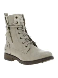Bottines écrues à talon décroché bas avec un zip et des lacets ronds