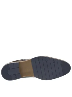 Bottines en cuir brunes avec un talon décroché bas et des lacets