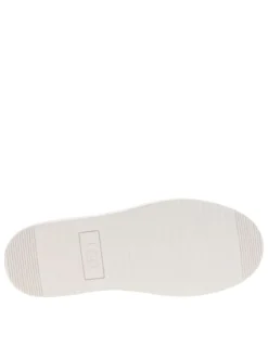 Bottines en cuir écrues avec une doublure fourrée et à lacets plats
