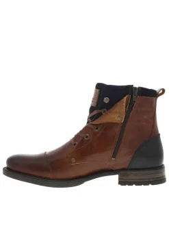 Bottines en cuir marron fourrées avec empiècements foncées, lacets tressés marrons et fermeture zippée