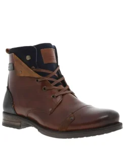 Bottines en cuir marron fourrées avec empiècements foncées, lacets tressés marrons et fermeture zippée