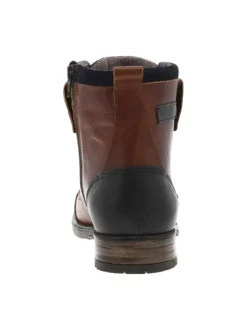 Bottines en cuir marron fourrées avec empiècements foncées, lacets tressés marrons et fermeture zippée