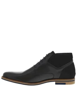 Bottines en cuir noires à bout droit avec un talon décroché bas