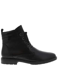 Bottines en cuir noires à talon plat avec un effet matelassé à l'arrière