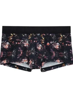 Boxer court noir fleuri avec une coupe près du corps et une taille élastiquée