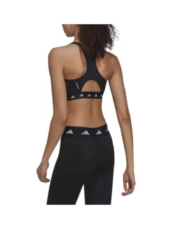 Brassière noire à col rond avec dos nageur et logo blanc floqué autour de la taille élastiquée