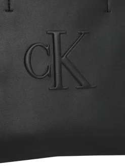 Cabas porté main noir uni avec le logo embossé à l'avant et deux anses