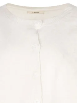 Cardigan beige et brodé aux manches, à col rond et à manches longues