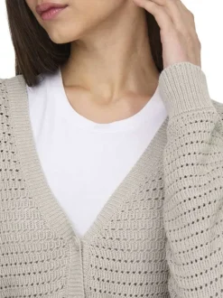 Cardigan beige uni en crochet ajouré avec une coupe droite et un col v
