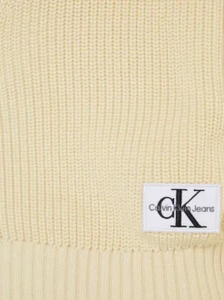 Cardigan en coton en transition écru avec une coupe relaxed et un col v