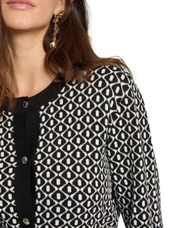 Cardigan noir à losanges bicolores et à coupe ajustée avec un col rond