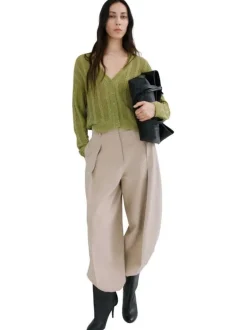 Cardigan olive uni pourvu d'une coupe droite et de manches longues