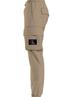 Cargo beige uni avec une coupe skinny fit et un lien de serrage à la taille