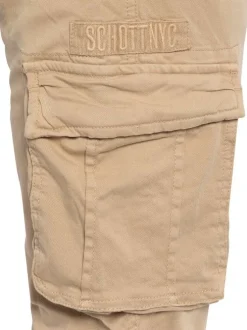 Cargo en coton beige uni avec une coupe slim fit et des poches à rabat