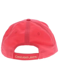 Casquette Dad Cap en coton rose unie avec initiale de la marque brodé en orange