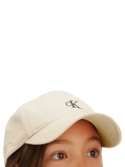 Casquette en coton biologique écrue unie avec une fermeture à scratch
