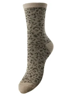 Chaussettes couleur taupe à tâches noires et avec une coupe haute