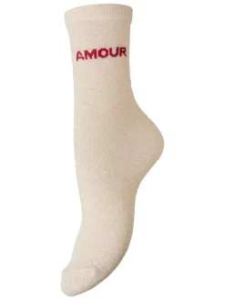 Chaussettes hautes beiges à imprimé pourvues de fils lurex dorés