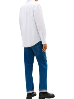 Chemise blanche en coton à coupe droite pourvue d'un col à revers
