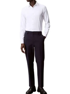 Chemise blanche unie à coupe slim et à manches longues boutonnées