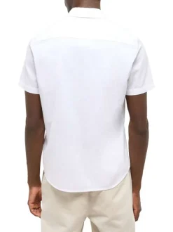 Chemise blanche unie en coton et lin mélangé avec une coupe droite