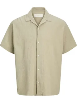 Chemise en coton beige à coupe droite pourvue d'un col cubain