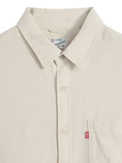 Chemise en coton beige à coupe droite pourvue d'un col à revers
