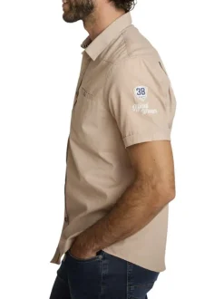Chemise en coton beige à coupe droite pourvue d'un col à revers