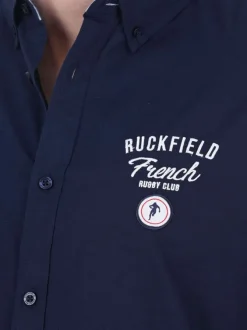 Chemise en coton biologique marine unie à coupe ajustée avec un col boutonné
