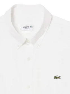 Chemise en coton blanche à coupe droite pourvue d'un col à revers