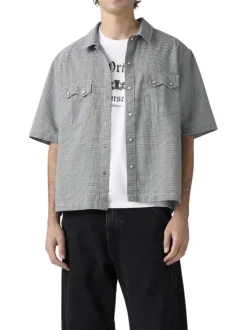 Chemise en coton blanche et noire unie avec une coupe droite et un col à revers