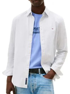Chemise en coton blanche à rayures avec une coupe droite et col à revers