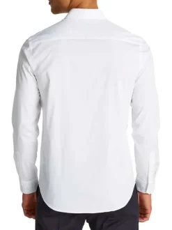 Chemise en coton blanche unie avec une coupe ajustée et le logo en petit