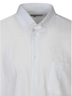 Chemise en coton blanche unie avec une coupe droite et un col américain