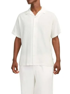 Chemise en coton blanche unie avec une coupe droite et un col français