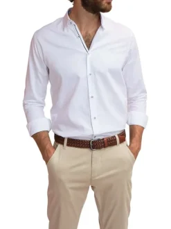 Chemise en coton blanche unie avec une coupe slim fit et des manches à pression