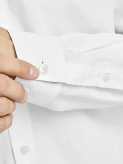 Chemise en coton blanche unie à coupe droite, col français et manches longues