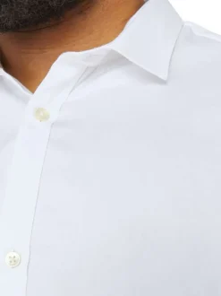 Chemise en coton blanche unie à coupe loose avec col italien et manches longues