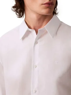 Chemise en coton blanche unie à coupe regular fit fermée par des boutons