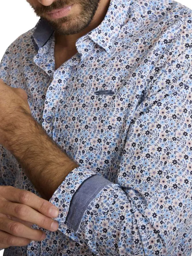 Chemise en coton bleu à coupe droite ornée d'un motif floral tricolore