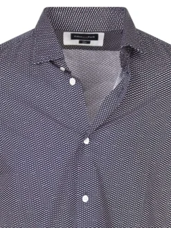 Chemise en coton bleue marine à minis pois avec une coupe slim