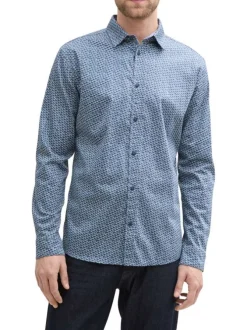 Chemise en coton bleue à petits imprimés avec une coupe ajustée