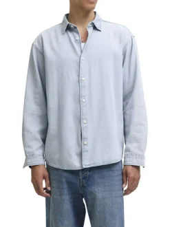 Chemise en coton bleue unie à coupe droite pourvue d'un col à revers
