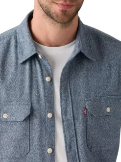 Chemise en coton bleu gris chinée avec une coupe droite et 2 poches