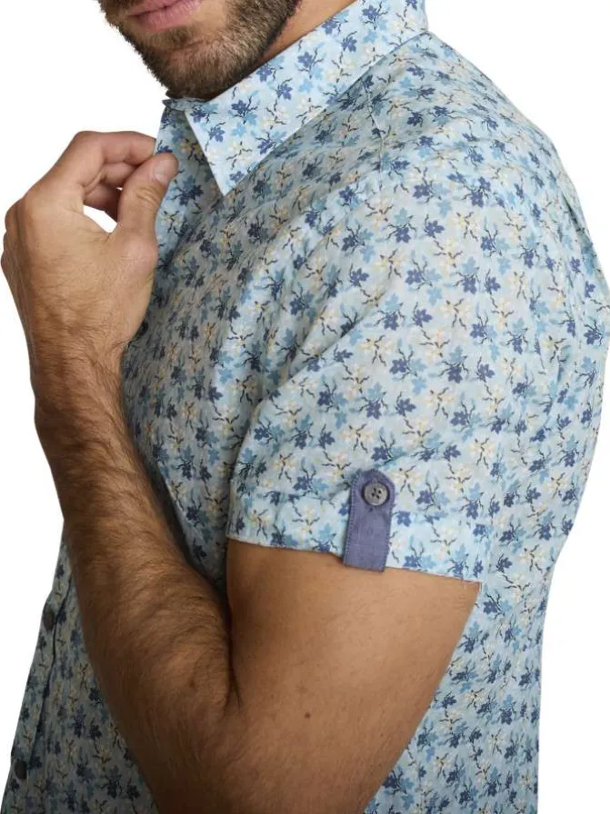 Chemise en coton ciel à coupe droite ornée d'un motif floral tricolore